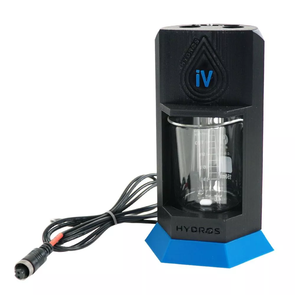 HYDROS iV testing vessel with magnetic stirrer, glass beaker, and kH reagent for aquarium alkalinity and water monitoring
