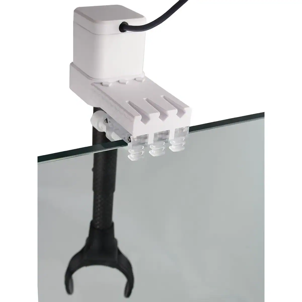 Tunze ORCA MK2 Powerhead Mount oscillating powerhead mount installed on reef aquarium glass
